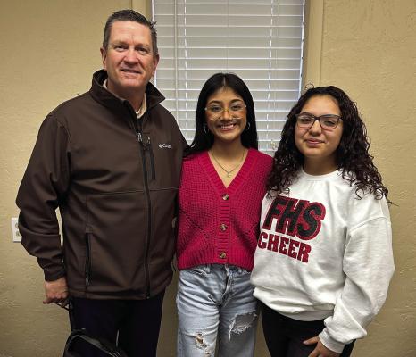 Lexi Flores and Rocio Ugalde were chosen Rotary Club’s January Students of the Month. Lexi (right) is the daughter of Jason and Claudia Martinez Flores and Rocio (center) is the daughter of Francisco and Rosa Ugalde. They are pictured with Rotarian and Frederick Hogh School principal Randy Biggs. Courtesy photo